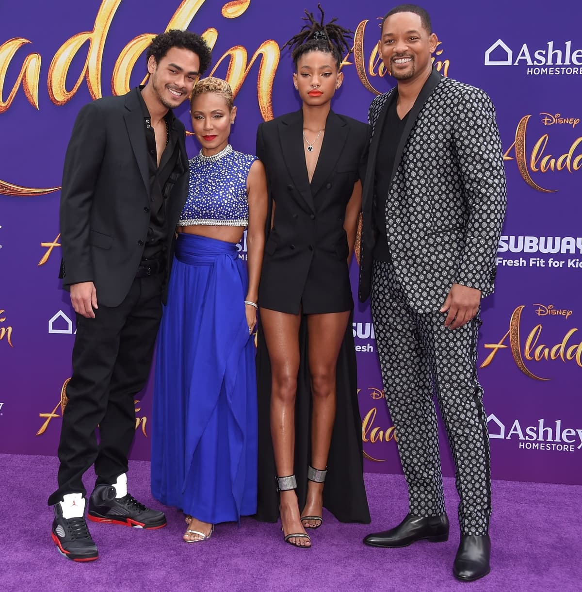 Jada Pinkett Smith is shorter than the average US woman and looks petite next to Trey Smith, Willow Smith, and Will Smith