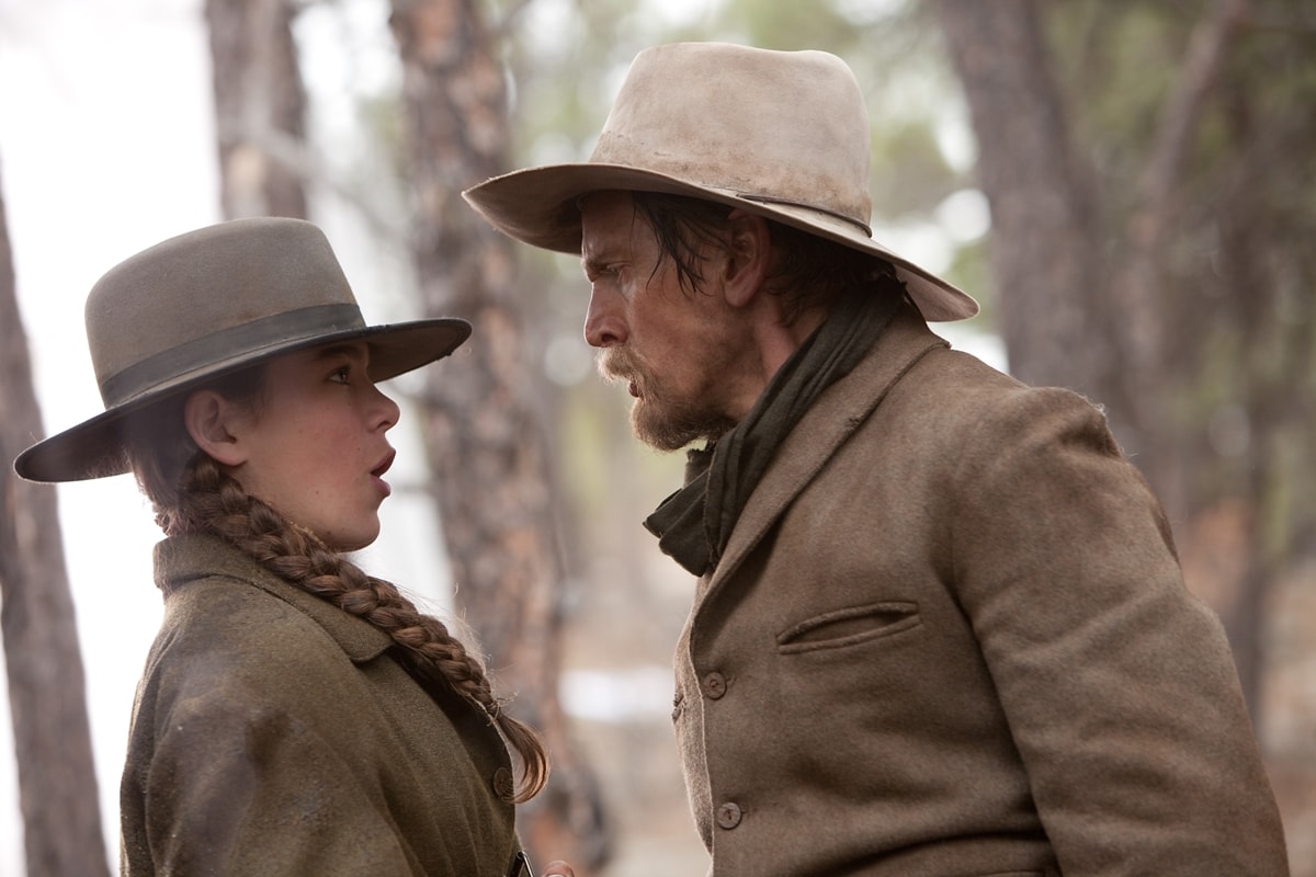 Barry Pepper as "Lucky" Ned Pepper and Hailee Steinfeld as Mattie Ross in the 2010 American Western film True Grit