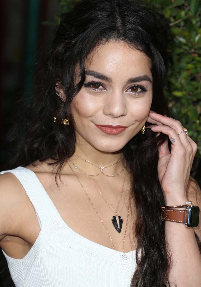 Vanessa Hudgens wears her hair down at the opening of "The Wizarding World Of Harry Potter"