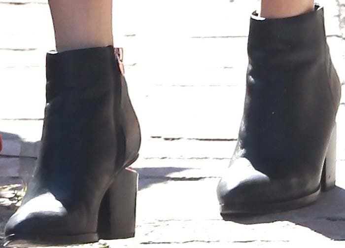 Vanessa Hudgens wears a pair of Alexander Wang boots to the salon 