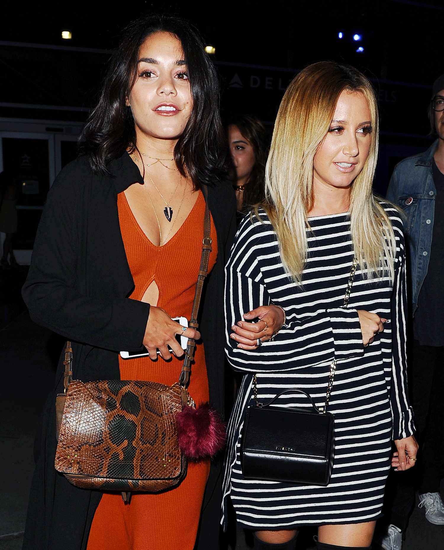 Vanessa Hudgens and Ashley Tisdale make their way to a Selena Gomez concert