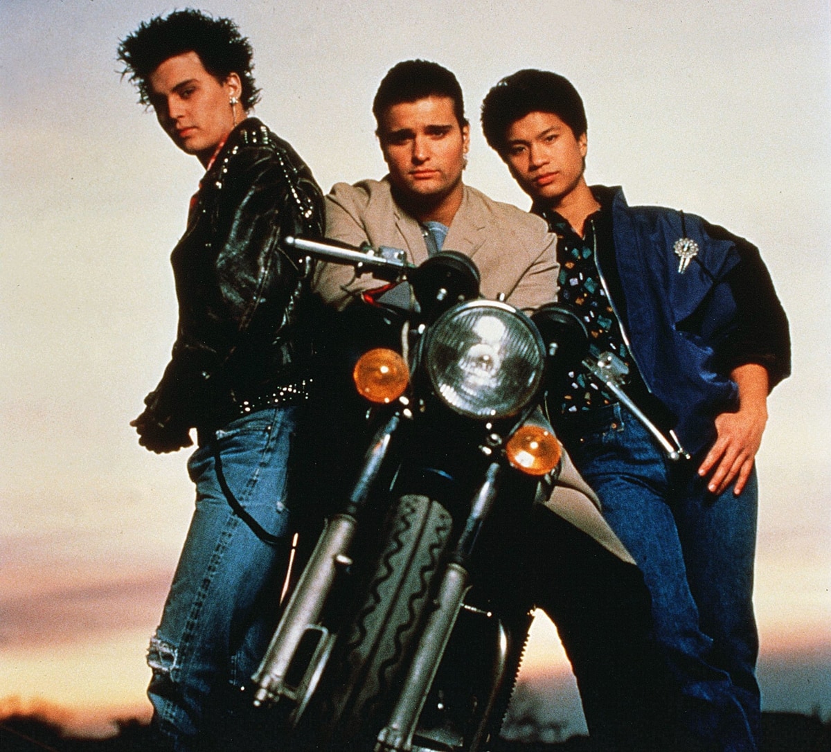 Johnny Depp as Officer Thomas "Tom" Hanson, Peter DeLuise as Officer Douglas "Doug" Penhall, and Dustin Nguyen as Sergeant Harry Truman "H.T" Ioki/Vinh Van Tran in the American police procedural television series 21 Jump Street