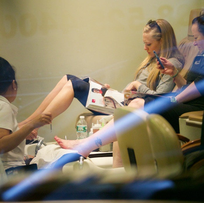 Amanda Seyfried relaxes with a pedicure at a salon in East Village, New York City, enjoying a little self-care time