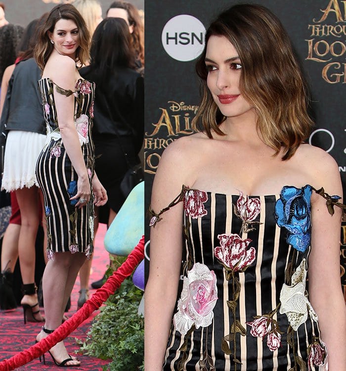 Anne Hathaway shows off the embroidery and appliqués on her striped Christopher Kane dress