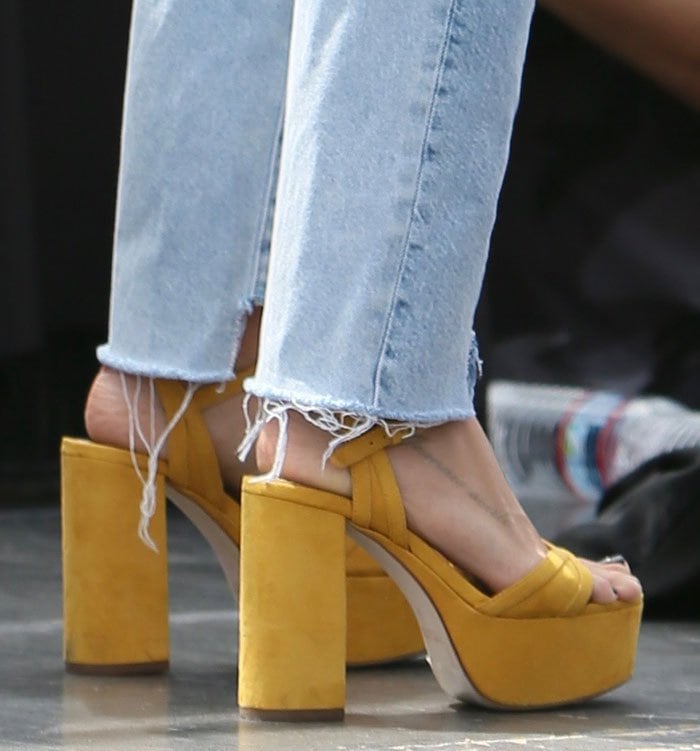 Ashley Tisdale shows off her feet in yellow platform sandals