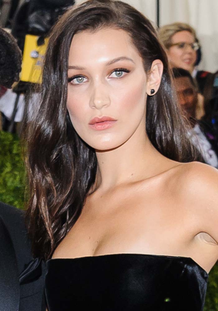 Bella Hadid wears her hair down at the annual Met Costume Institute Gala themed "Manus x Machina: Fashion in the Age of Technology"