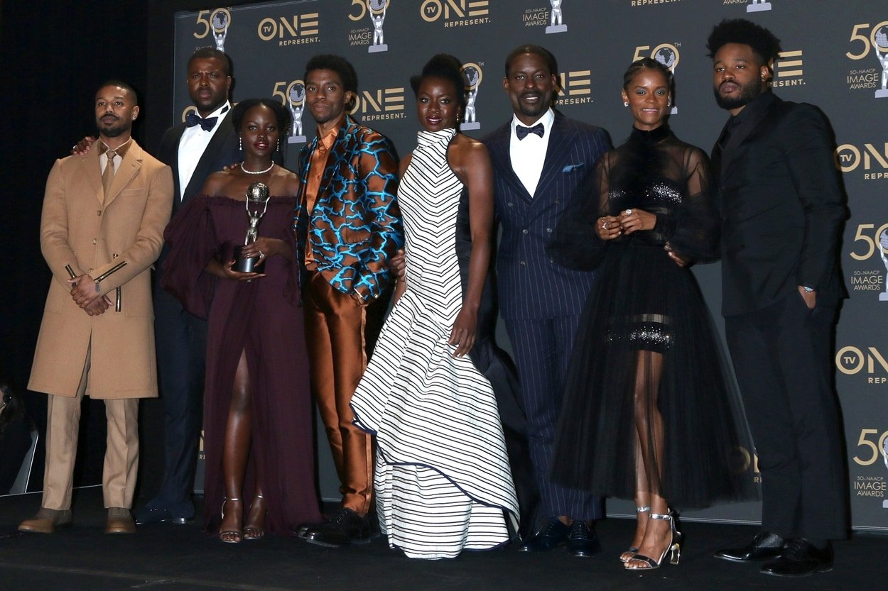 Michael B. Jordan, Winston Duke, Lupita Nyong'o, Chadwick Boseman, Danai Gurira, Sterling K. Brown, Letitia Wright, and Ryan Coogler celebrate yet another Black Panther award at the 50th NAACP Image Awards