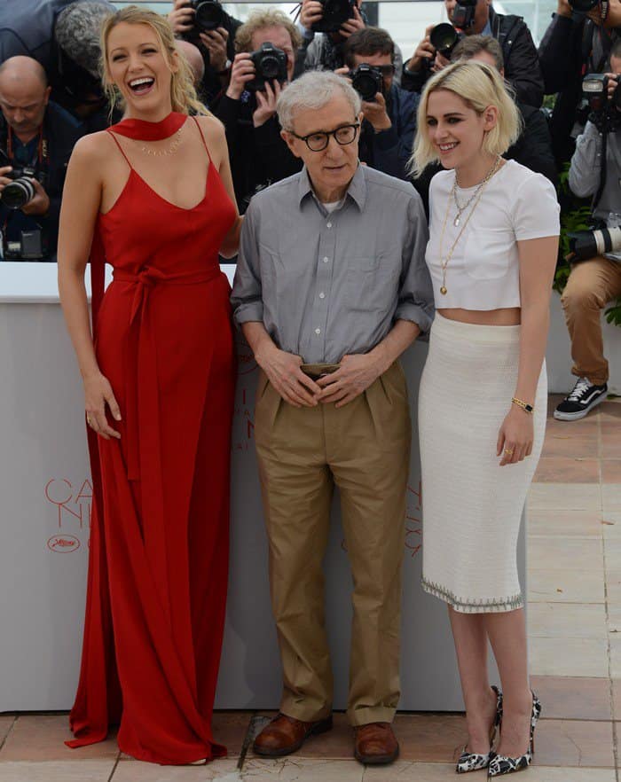 Director Woody Allen, Kristen Stewart, and Blake Lively strike a pose while attending their photo call for Cafe Society