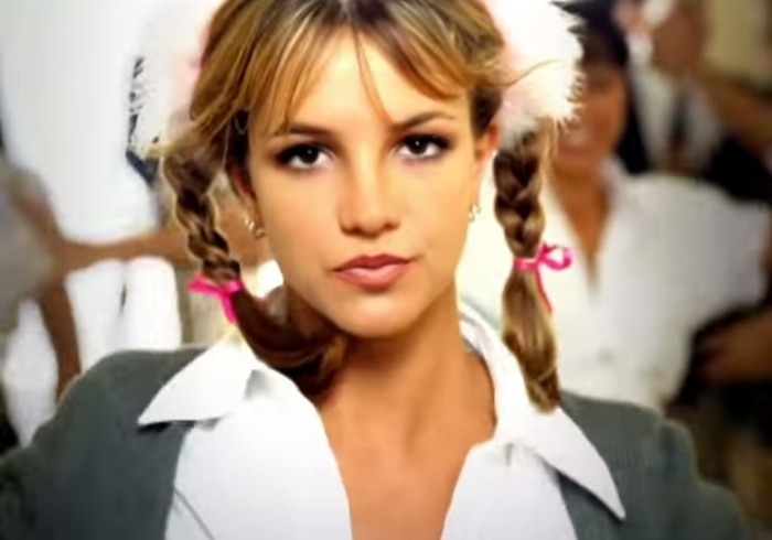 Britney Spears in the music video for "...Baby One More Time," her debut single from 1999