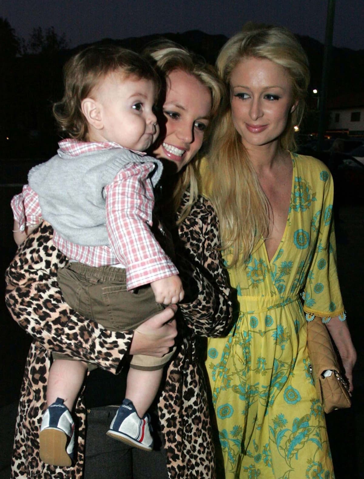 Britney Spears carries Sean Preston with her friend Paris Hilton in Malibu