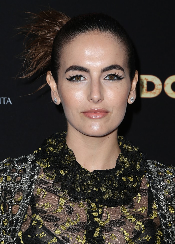 Camilla Belle styles her hair into an edgy updo for the premiere of Pantelion Films