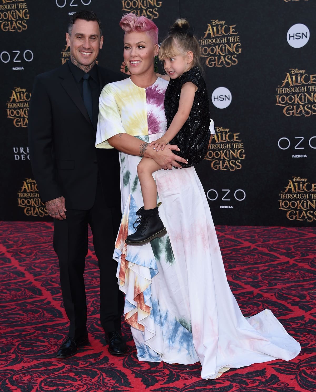 During the "Alice Through The Looking Glass" American Premiere on May 23, 2016, in Hollywood, Carey Hart commanded a height of 5′ 11″ (1.80 m), in contrast to Pink's stature of 5ft 3 (160 cm), alongside Willow Hart