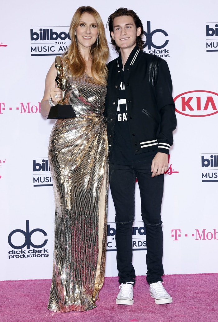 Celine Dion poses with her son, René-Charles, on the pink carpet of the Billboard Music Awards