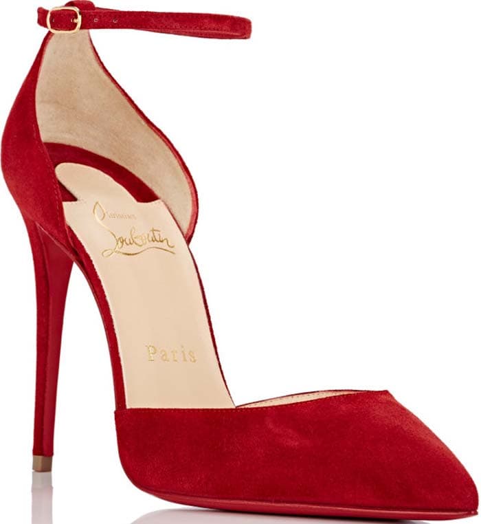 Crimson suede Christian Louboutin Uptown pointed-toe pumps with tonal stitching, concealed heels, and buckle closures at the ankles