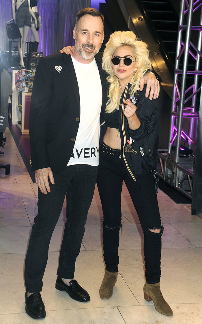 David Furnish and Lady Gaga pose for photos at the launch of the "Love Bravery" clothing line