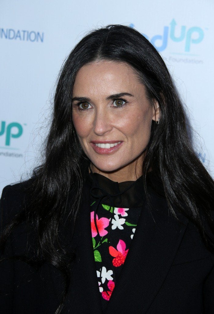 Demi Moore with her signature long black hair