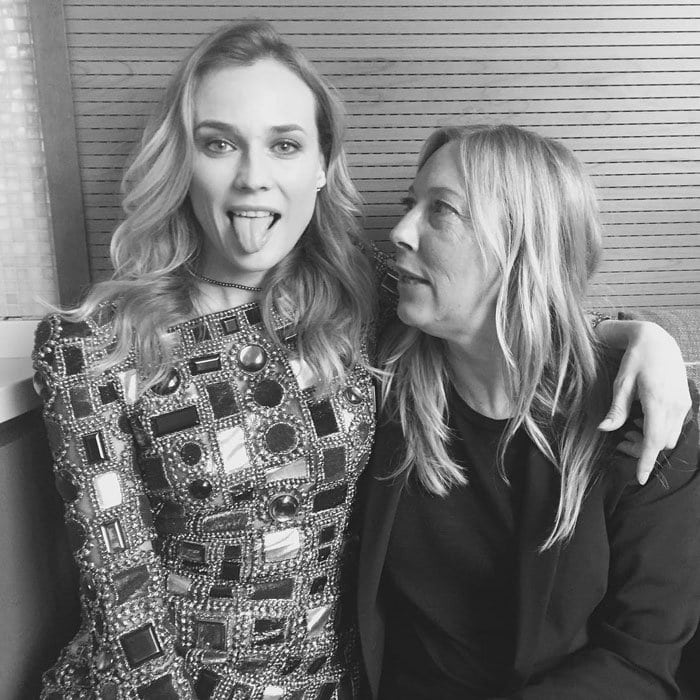 Posing with director Fabienne Berthaud, Diane Kruger sticks out her tongue while promoting "Sky" in Berlin