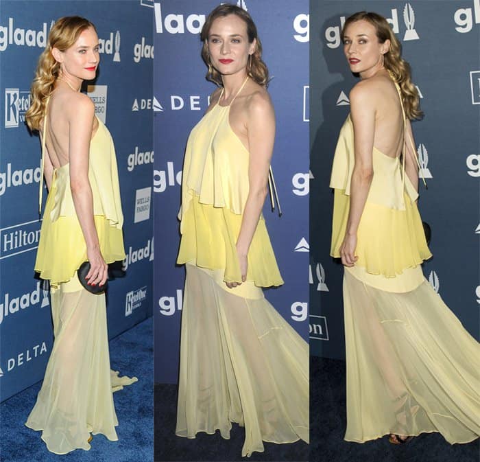 The vibrant yellow color complements Diane Kruger's fair complexion, and the sheer fabric adds a touch of ethereal elegance to the look