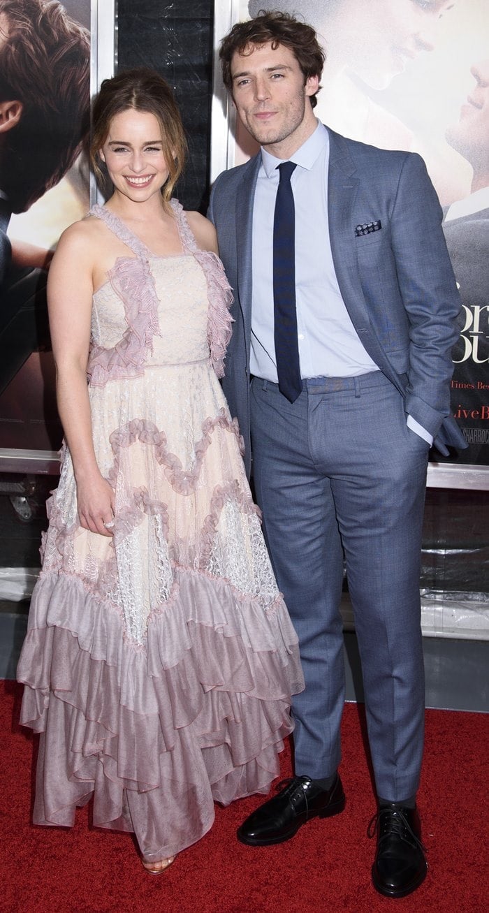 Emilia Clarke poses with her costar, Sam Claflin, on the red carpet of the "Me Before You" premiere