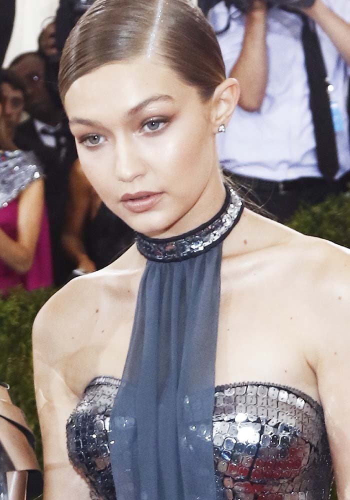 Gigi Hadid side parts her hair at the "Manus x Machina: Fashion in the Age of Technology" Metropolitan Museum of Art Costume Institute Gala