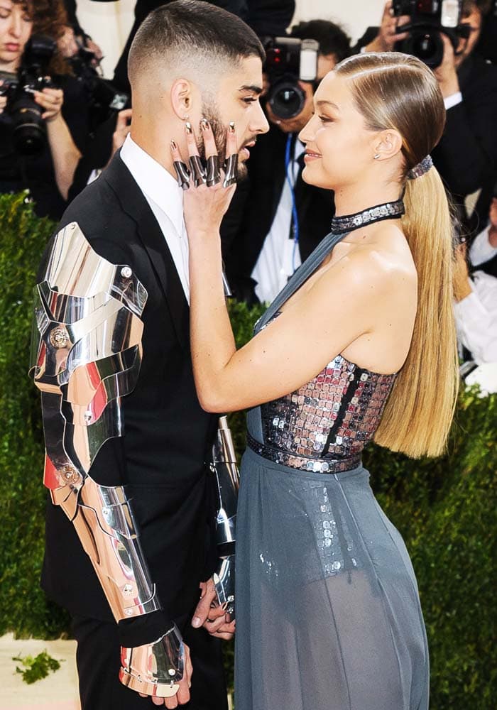 Zayn Malik and Gigi Hadid wear matching robotic-themed costumes at the 2016 Met Gala