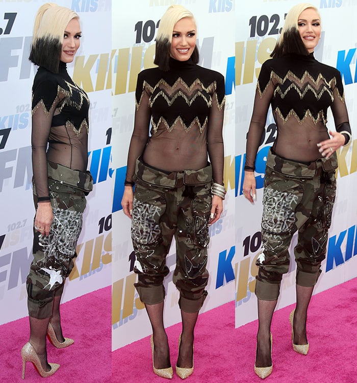 Gwen Stefani teams her dip-dyed hair with an Elisabetta Franchi bodysuit, camo-print pants and fishnets