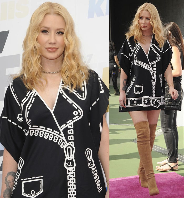 Iggy Azalea wears a black blazer-printed dress with thigh-high boots