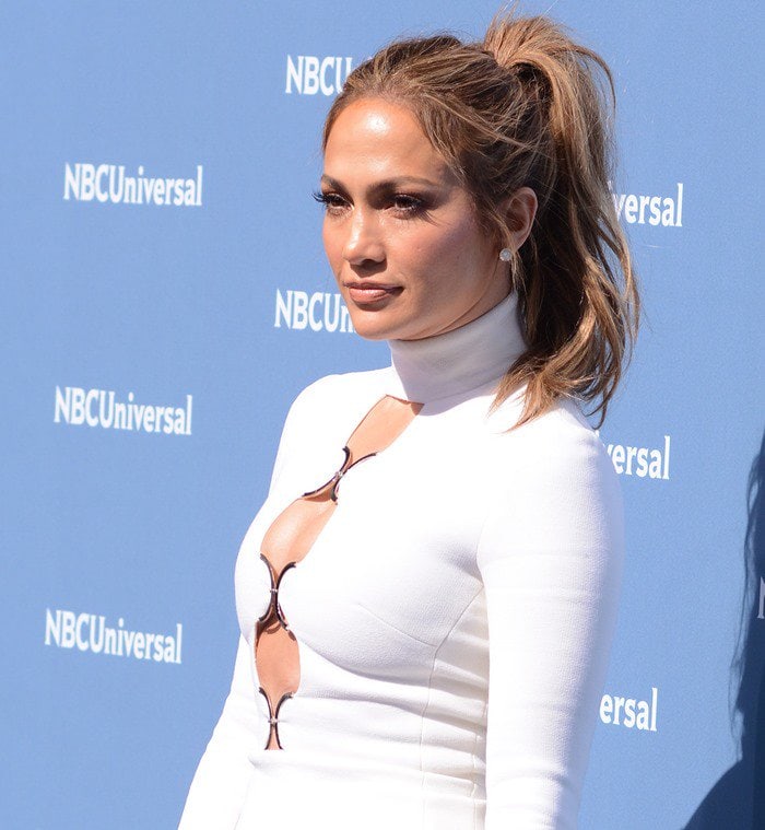 Jennifer Lopez in a figure-hugging white mini dress from David Koma