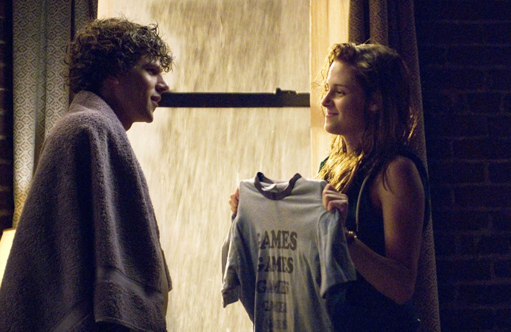 Jesse Eisenberg as James Brennan and Kristen Stewart as Em Lewin in the 2009 American comedy-drama film Adventureland