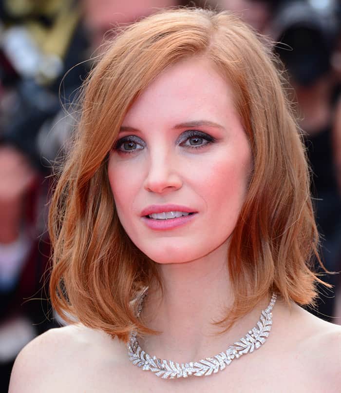 Jessica Chastain dazzles at Cannes with her flawless beauty, complemented by a sparkling Piaget necklace from the 'Sunny Side of Life' collection