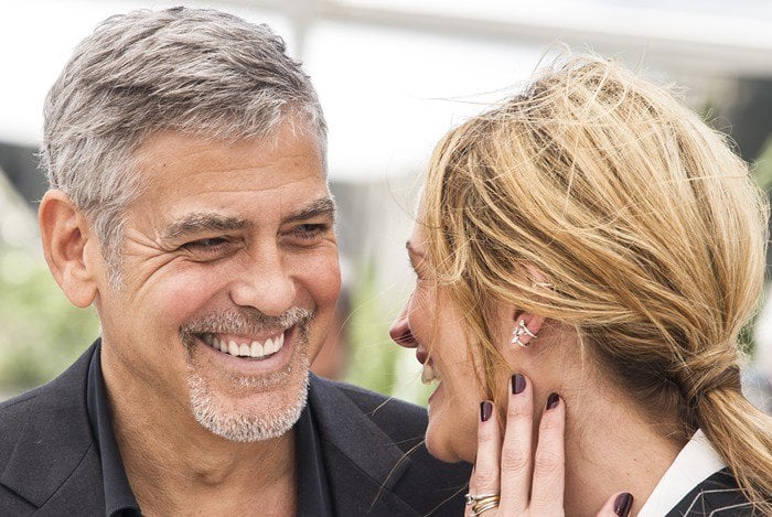 George Clooney and Julia Roberts at the photo call for their upcoming film 'Money Monster' held during the 2016 Cannes Film Festival at the Palais des Festivals in Cannes on May 12, 2016