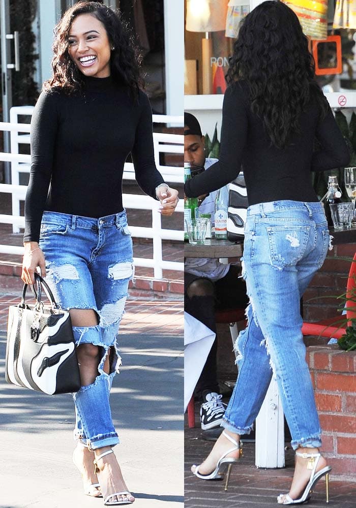 Karrueche Tran in distressed cigarette jeans from Zara