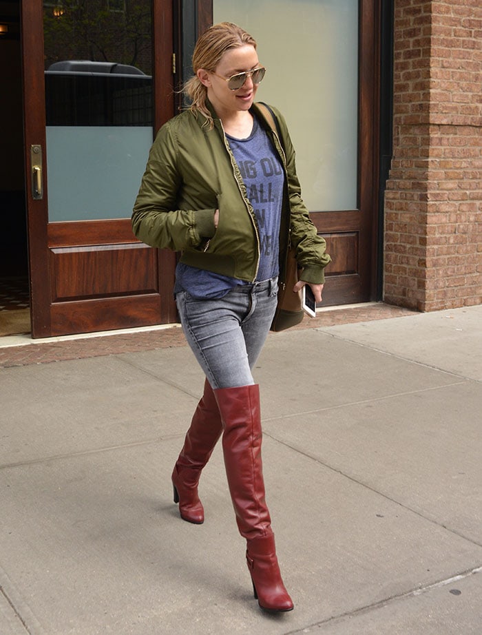 Kate Hudson slipped into a pair of oxblood thigh-high boots