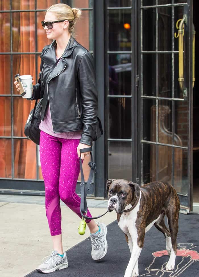 Wearing Asics Gel Evolution 6 T164n sneakers, Kate Upton leaves The Bowery Hotel in New York City's Lower East Side the day after Met Gala