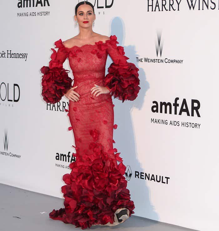 Katy Perry's gown boasted dramatic sleeves and a gracefully short train, elevating her appearance to a mesmerizing level at amfAR’s 2016 Cinema Against AIDS Gala