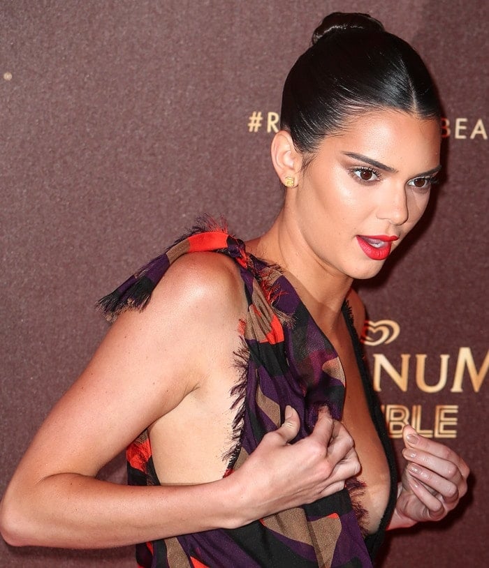 Kendall Jenner wears a daring Versace gown during a Cannes Film Festival event