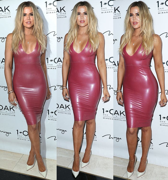 Khloé Kardashian accessorizes with a lariat necklace, bangles and a few rings