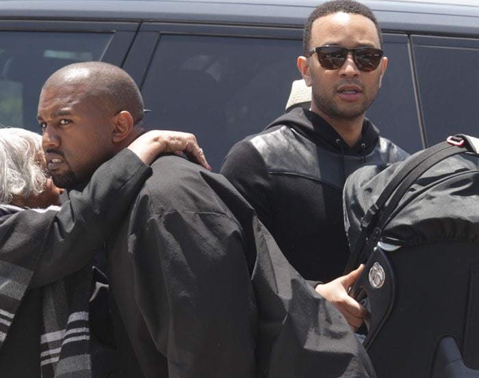 Full support: dads Kanye West and John Legend join their wives and children for lunch