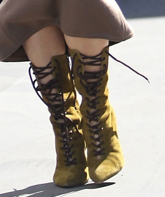 Kim Kardashian steps out in khaki Yeezy Season 3 lace-up suede boots