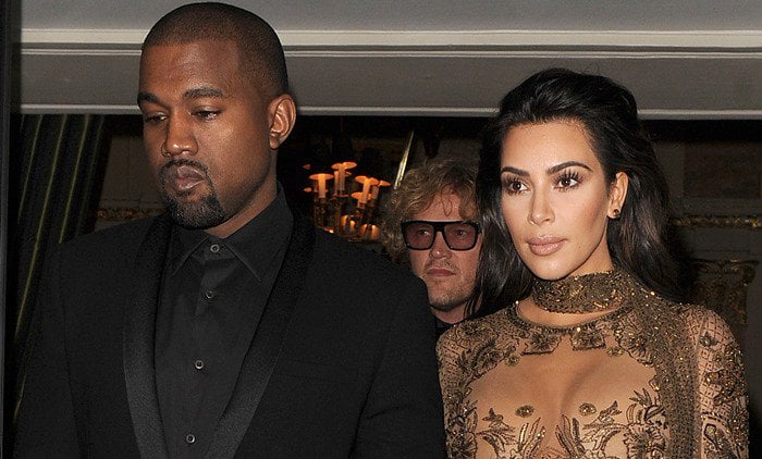 Kim Kardashian and Kanye West leave their hotel and head to the Vogue 100 Gala Dinner, held in Hyde Park