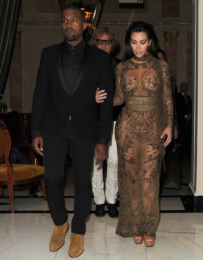 Kim Kardashian left little to the imagination in her horrific ultra-sheer, embroidered dress