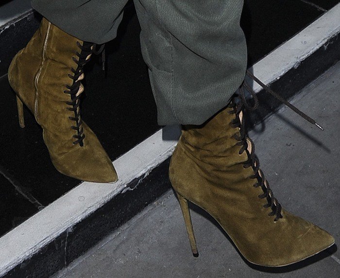 Kim Kardashian wears lace-up olive suede Adidas Yeezy boots