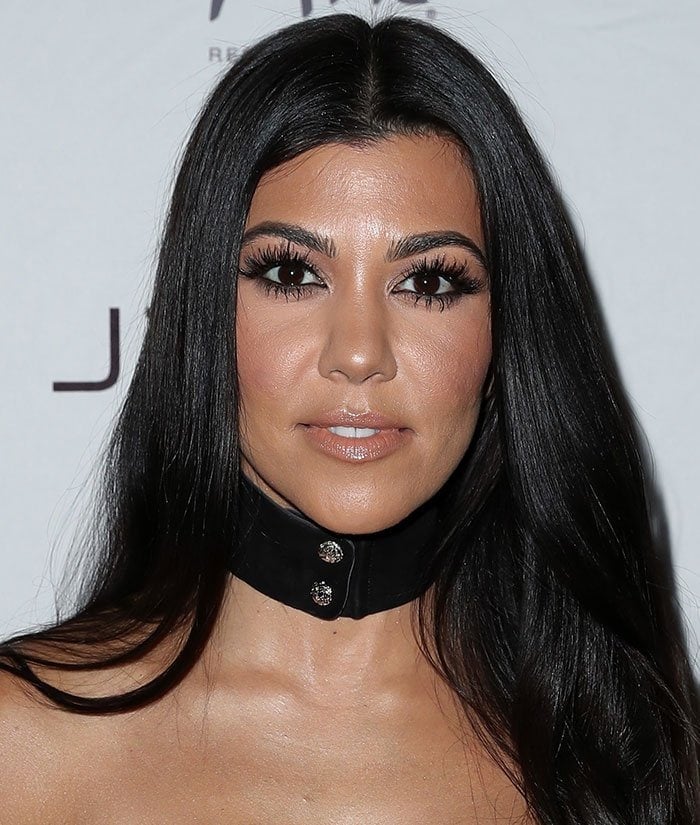 Kourtney Kardashian wears her dark hair down at the Jewel Nightclub at ARIA Resort & Casino Grand Opening Weekend