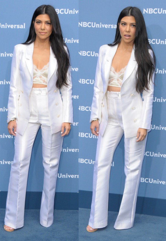 Kourtney Kardashian with neutral, sultry makeup and glistening straight locks