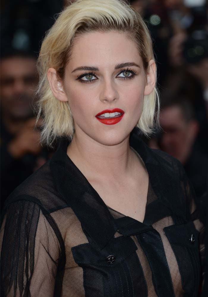 Kristen Stewart shows off the dark roots of her blonde hair at the 69th annual Cannes Film Festival Opening Night Gala