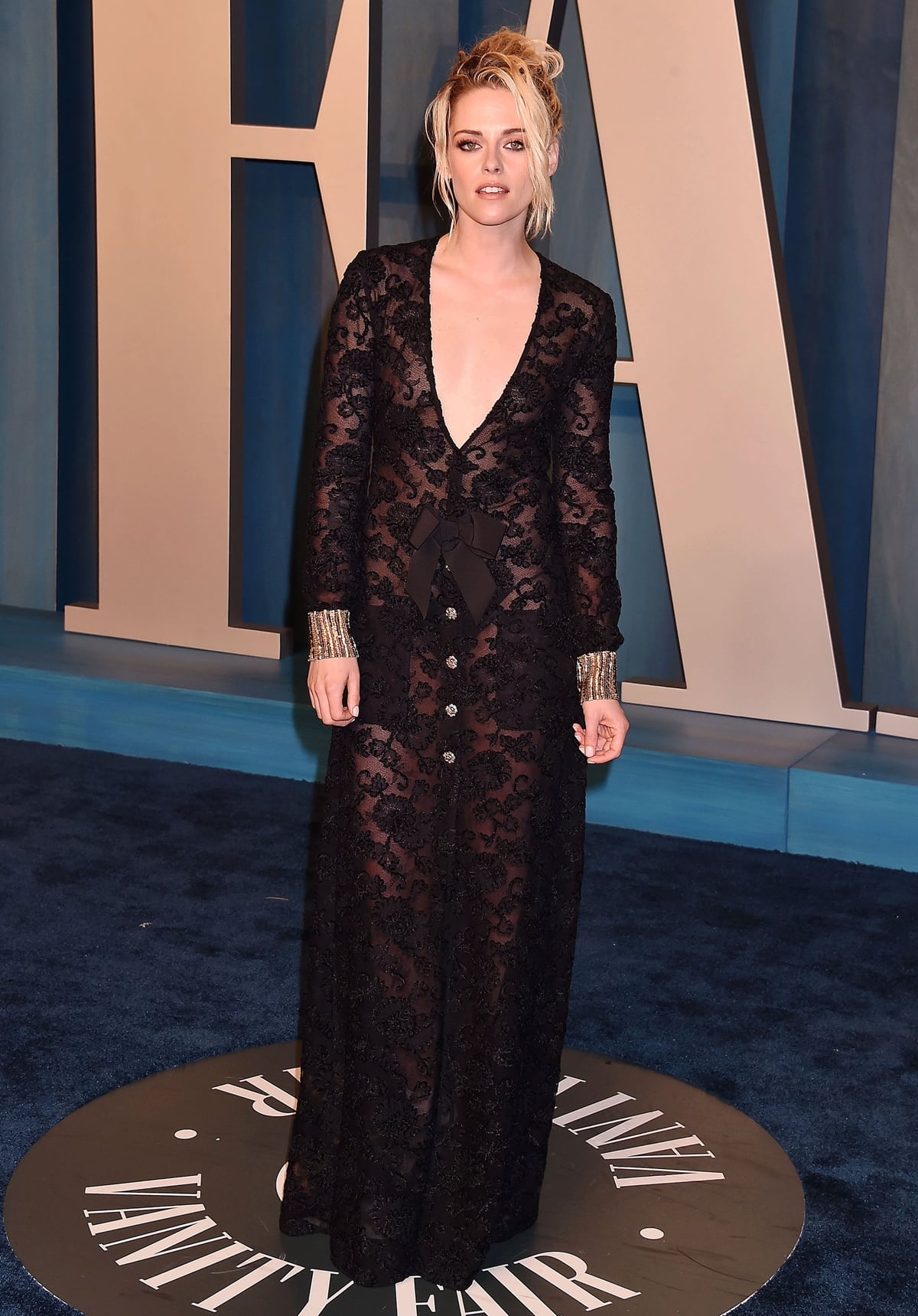 Kristen Stewart in a black sheer Chanel Fall 2022 dress at the 2022 Vanity Fair Oscar Party