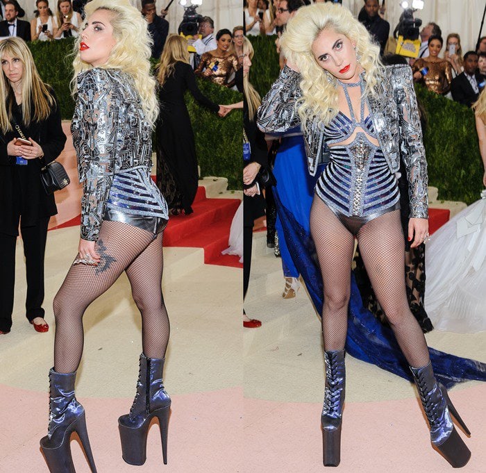 Lady Gaga shows off her tattoos in a Versace circuit board jacket styled with fish nets and a leotard