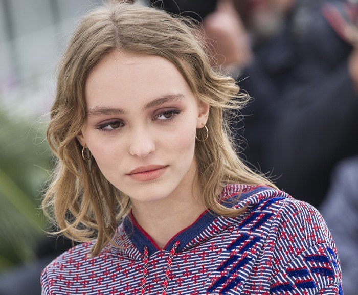 Lily-Rose Depp wears her hair down at a photo call for her film "The Dancer" (La Danseuse) during the 2016 Cannes Film Festival