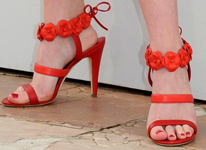 Lily-Rose Depp's feet in red Chanel sandals