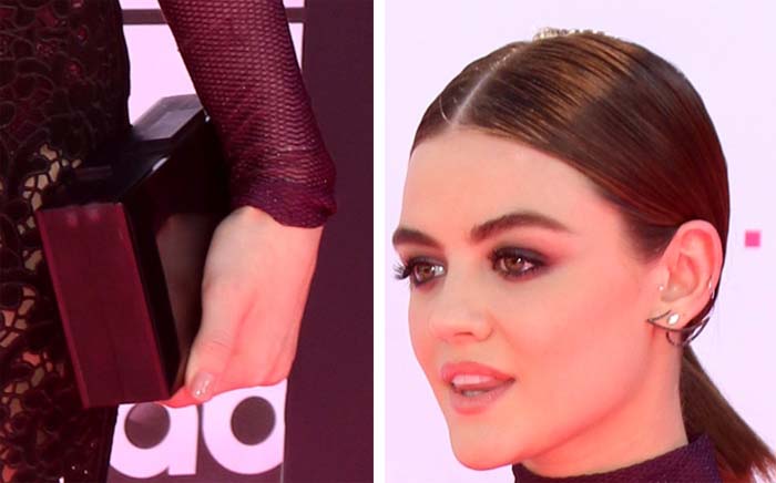 Lucy Hale accessorizes with a Rauwolf clutch, Kavant & Sharart earrings, and Paige Novick rings